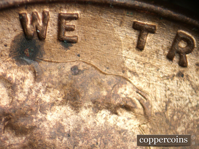 Die-stage B marker on 1939P•1DR•005 (1939 Doubled Die Reverse).