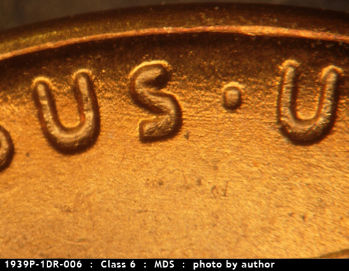 Die-stage B marker on 1939P•1DR•006 (1939 Doubled Die Reverse).