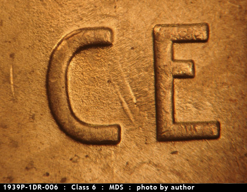 Die-stage B marker on 1939P•1DR•006 (1939 Doubled Die Reverse).