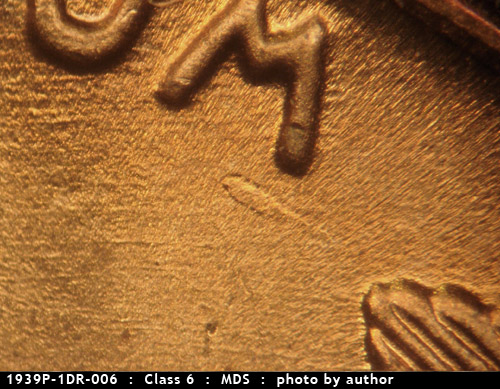 Die-stage B marker on 1939P•1DR•006 (1939 Doubled Die Reverse).