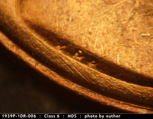 Die-stage B marker on 1939P•1DR•006 (1939 Doubled Die Reverse).