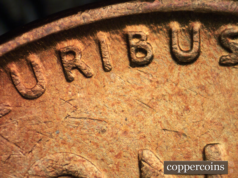 Die-stage B marker on 1939P•1DR•007 (1939 Doubled Die Reverse).