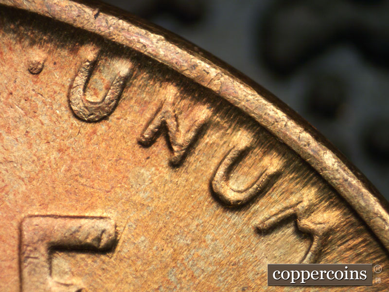 Die-stage B marker on 1939P•1DR•007 (1939 Doubled Die Reverse).