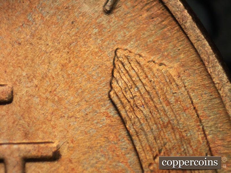 Die-stage B marker on 1939P•1DR•007 (1939 Doubled Die Reverse).