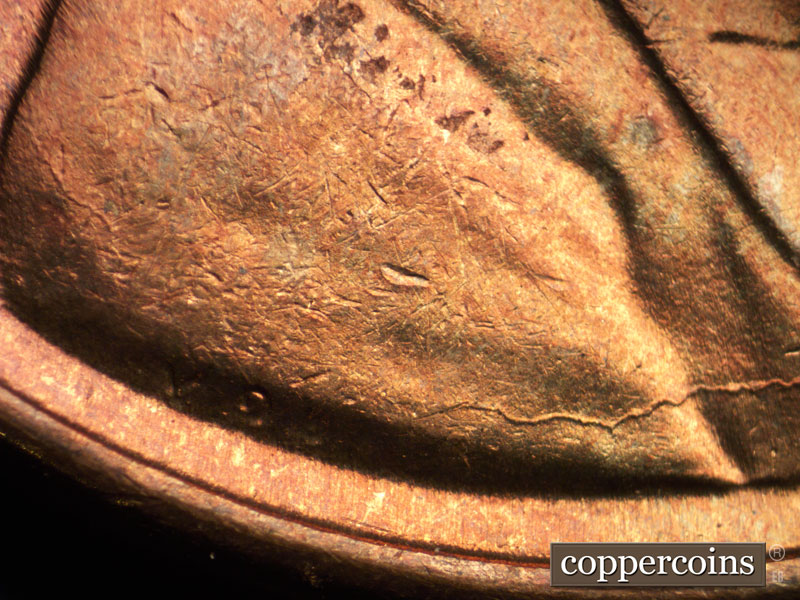 Die-stage B marker on 1939P•1DR•007 (1939 Doubled Die Reverse).