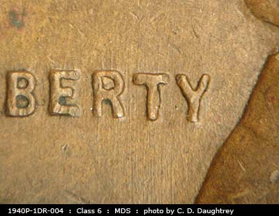 Die-stage B marker on 1940P•1DR•004 (1940 Doubled Die Reverse).