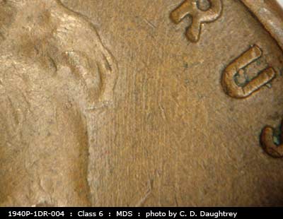 Die-stage B marker on 1940P•1DR•004 (1940 Doubled Die Reverse).