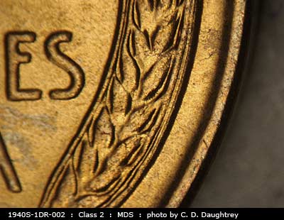 Die-stage B marker on 1940S•1DR•002 (1940 Doubled Die Reverse).
