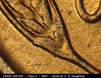Die-stage B marker on 1940S•1DR•002 (1940 Doubled Die Reverse).
