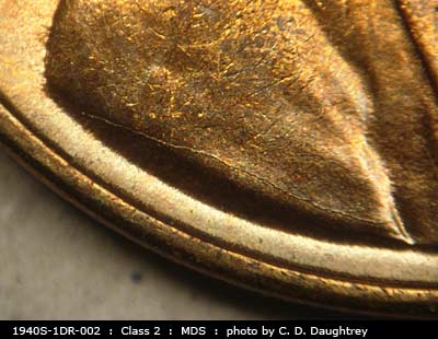 Die-stage B marker on 1940S•1DR•002 (1940 Doubled Die Reverse).