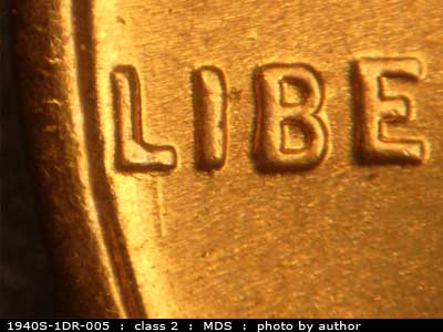 Die-stage B marker on 1940S•1DR•005 (1940 Doubled Die Reverse).
