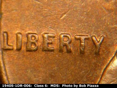 Die-stage B marker on 1940S•1DR•006 (1940 Doubled Die Reverse).
