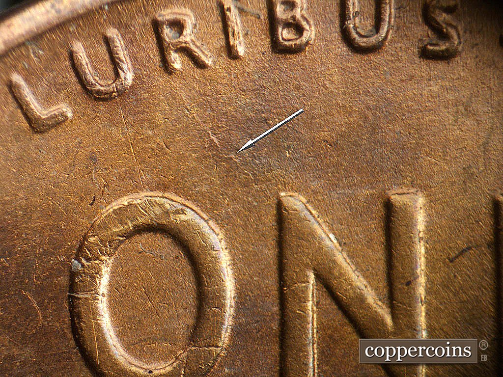 Die-stage B marker on 1941D•1DO•002 showing Die crack from rim to N in ONE.