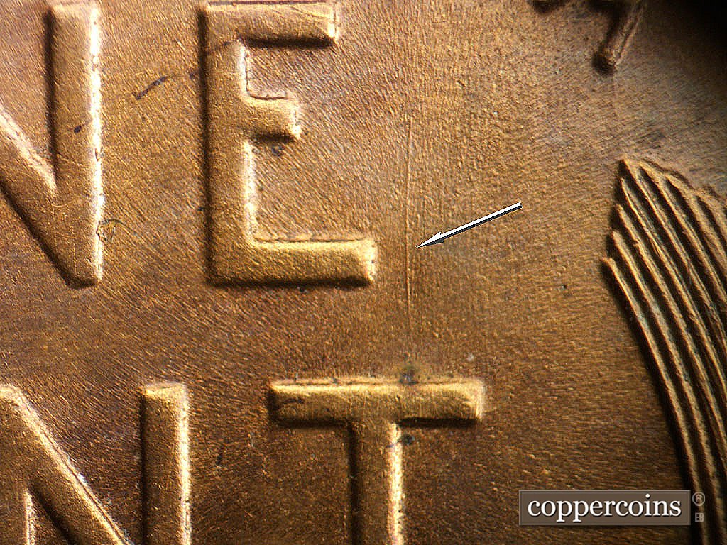 Die-stage B marker on 1941D•1DO•002 showing N/S die scratch above T in CENT.