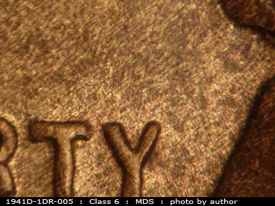 Die-stage B marker on 1941D•1DR•005 (1941 Doubled Die Reverse).