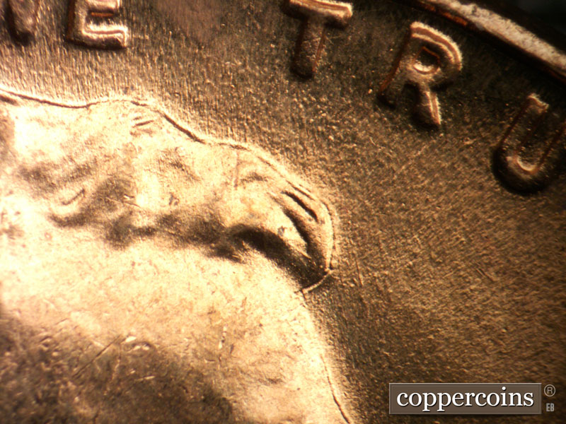 Die-stage B marker on 1941P•1DO•042 (1941 Doubled Die Obverse).