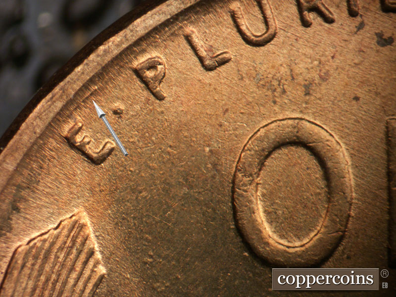 Die-stage B marker on 1941P•1DO•042 (1941 Doubled Die Obverse).