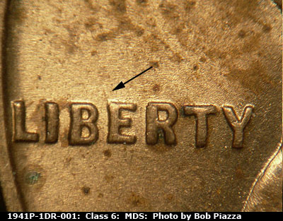 Die-stage B marker on 1941P•1DR•001 (1941 Doubled Die Reverse).