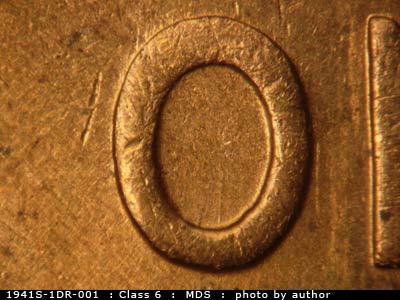 Die-stage B marker on 1941S•1DR•001 (1941 Doubled Die Reverse).