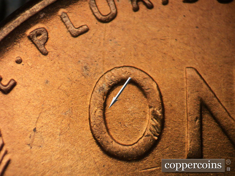 Die-stage A marker on 1942D•1DO•005 (1942 Doubled Die Obverse).