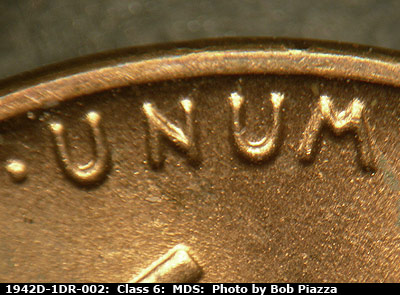 Die-stage B marker on 1942D•1DR•002 (1942 Doubled Die Reverse).