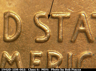 Die-stage B marker on 1942D•1DR•002 (1942 Doubled Die Reverse).