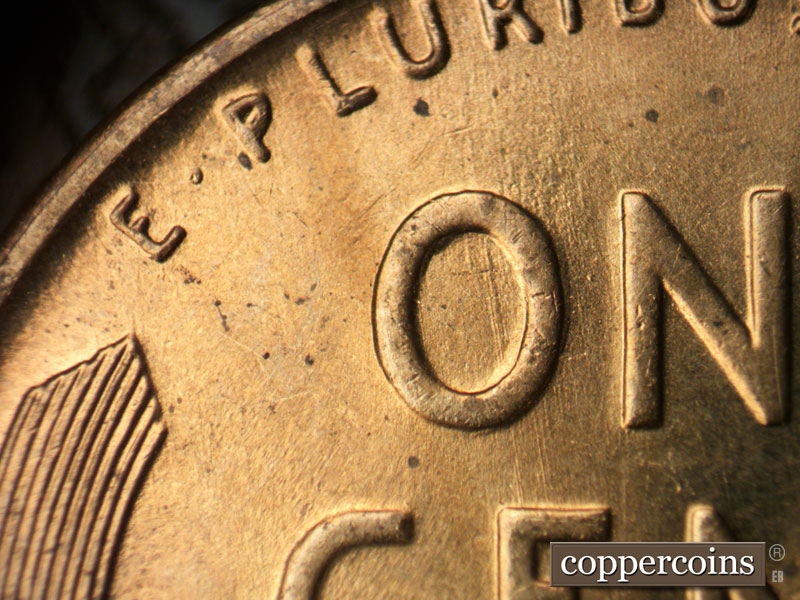 Die-stage C marker on 1942D•1DR•004 (1942 Doubled Die Reverse).