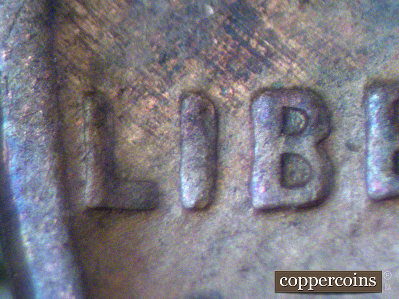 Die-stage B marker on 1942P•1DO•008 (1942 Doubled Die Obverse).