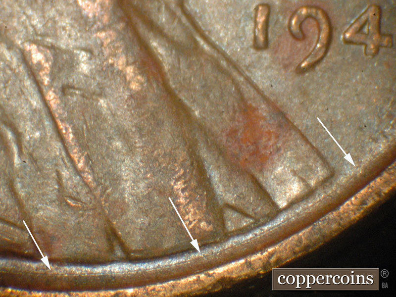 Die-stage B marker on 1942P•1DO•014 (1942 Doubled Die Obverse).