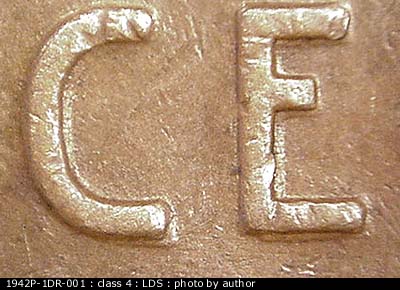 Die-stage C marker on 1942P•1DR•001 (1942 Doubled Die Reverse).