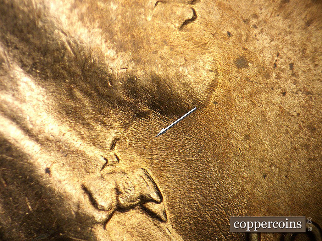 Die-stage B marker on 1942P•1DR•003 showing Die clash at throat.