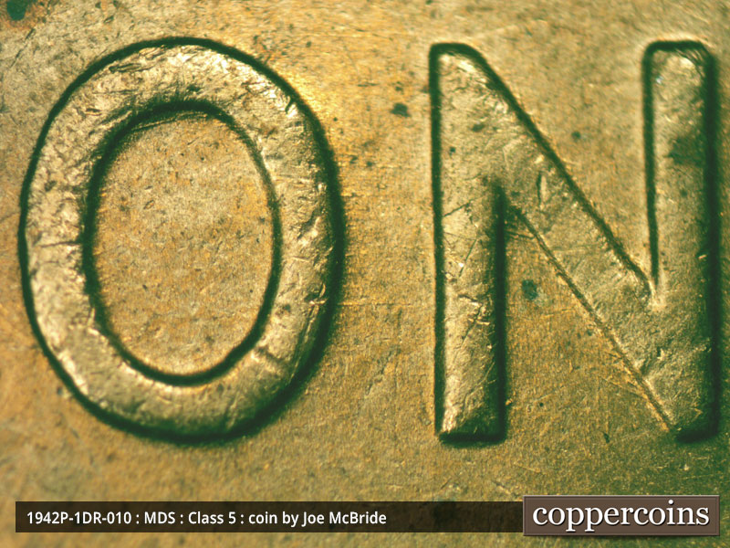 Die-stage B marker on 1942P•1DR•010 (1942 Doubled Die Reverse).