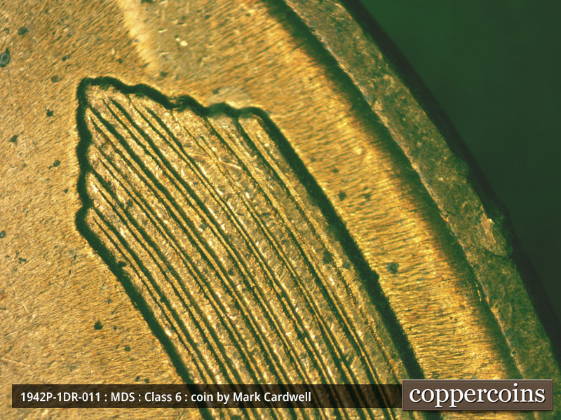 Die-stage B marker on 1942P•1DR•011 (1942 Doubled Die Reverse).