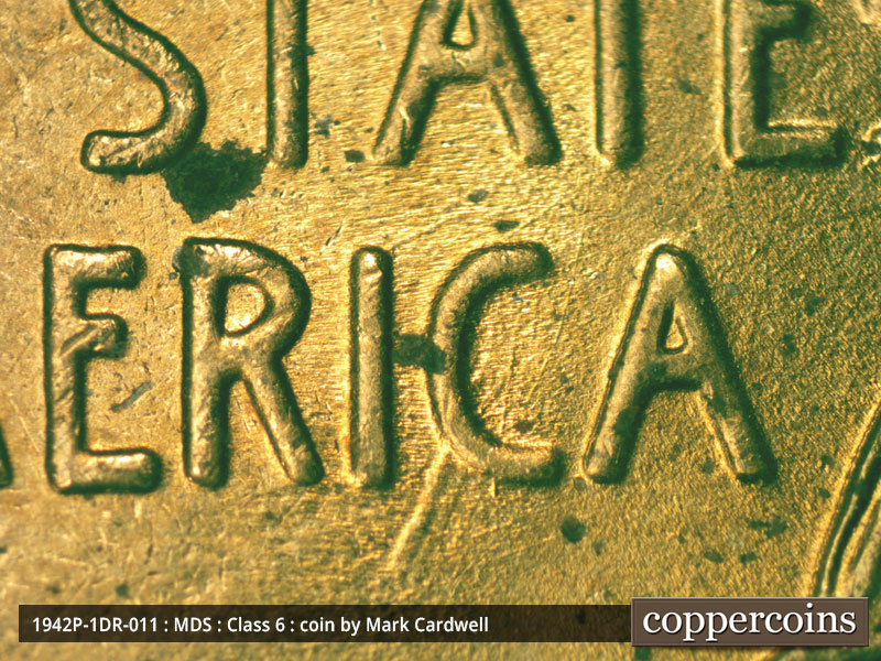 Die-stage B marker on 1942P•1DR•011 (1942 Doubled Die Reverse).