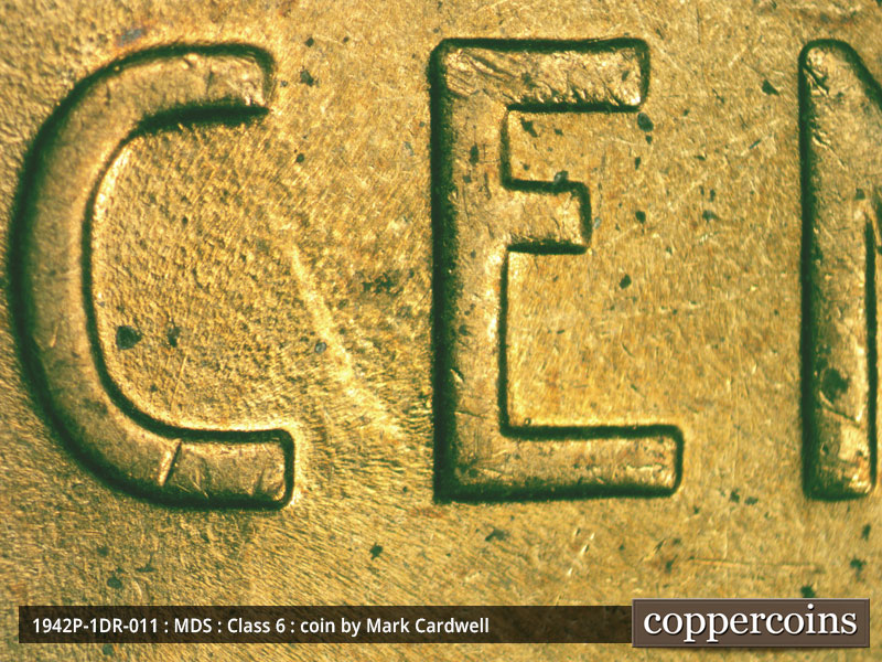 Die-stage B marker on 1942P•1DR•011 (1942 Doubled Die Reverse).