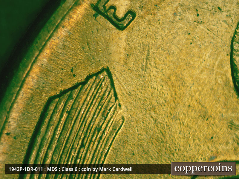 Die-stage B marker on 1942P•1DR•011 (1942 Doubled Die Reverse).
