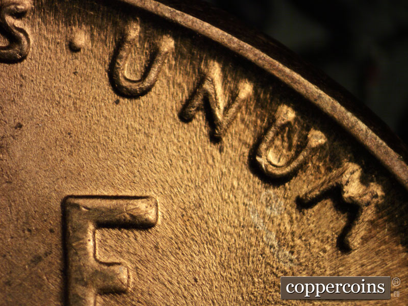 Die-stage B marker on 1942P•1DR•013 (1942 Doubled Die Reverse).