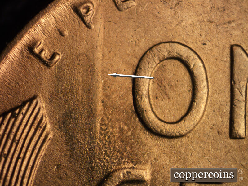 Die-stage B marker on 1942P•1DR•013 (1942 Doubled Die Reverse).