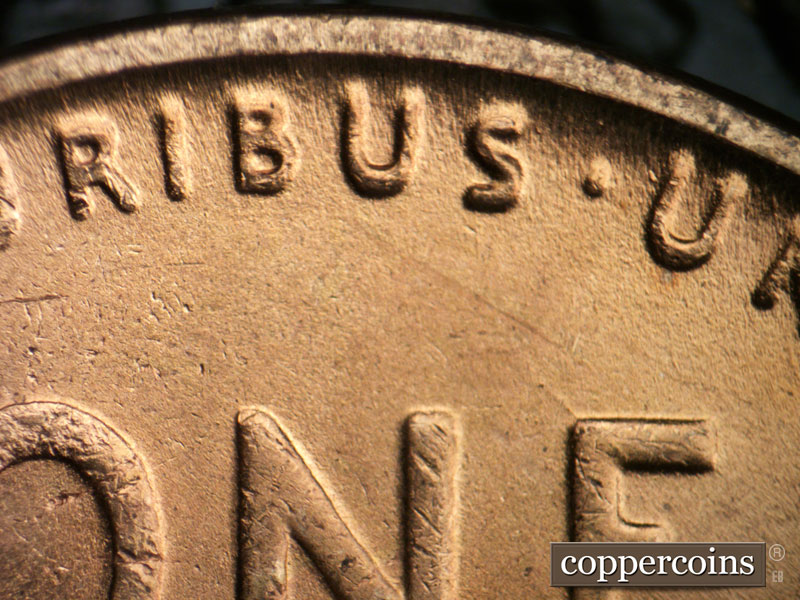 Die-stage B marker on 1942P•1DR•017 (1942 Doubled Die Reverse).
