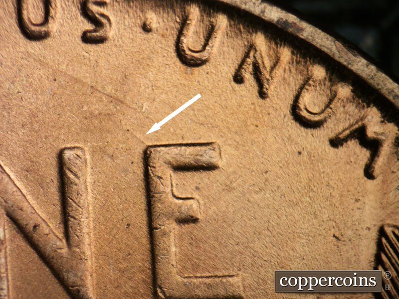Die-stage B marker on 1942P•1DR•017 (1942 Doubled Die Reverse).