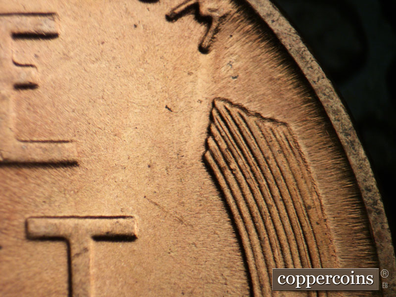 Die-stage B marker on 1942P•1DR•017 (1942 Doubled Die Reverse).