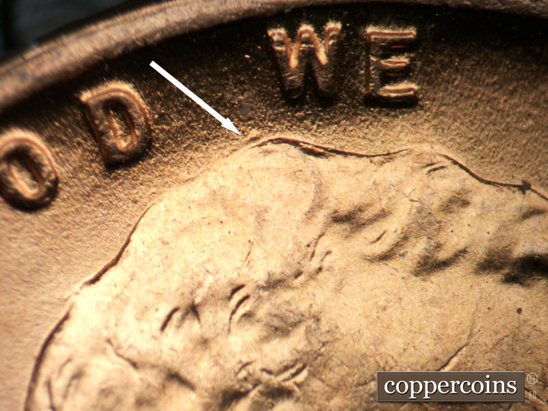 Die-stage B marker on 1942P•1DR•017 (1942 Doubled Die Reverse).