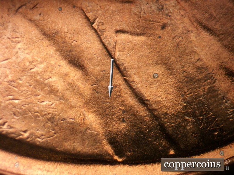 Die-stage C marker on 1942P•1DR•018 (1942 Doubled Die Reverse).