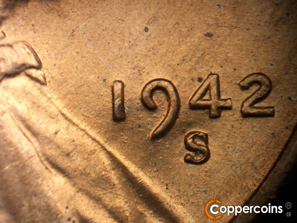 Die-stage A marker on 1942S•1DO•004 showing EDS die pitting near date.