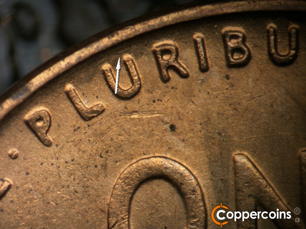 Die-stage A marker on 1942S•1DO•004 showing Die scratch abvove first U in PLURIBUS.