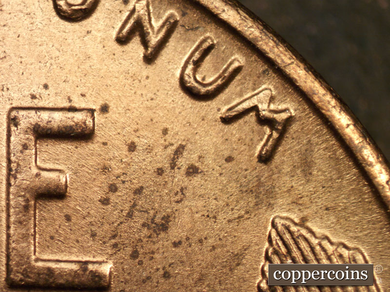 Die-stage B marker on 1942S•1DR•001 (1942 Doubled Die Reverse).
