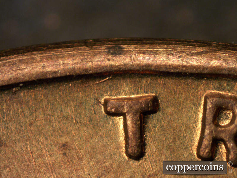 Die-stage B marker on 1942S•1DR•001 (1942 Doubled Die Reverse).