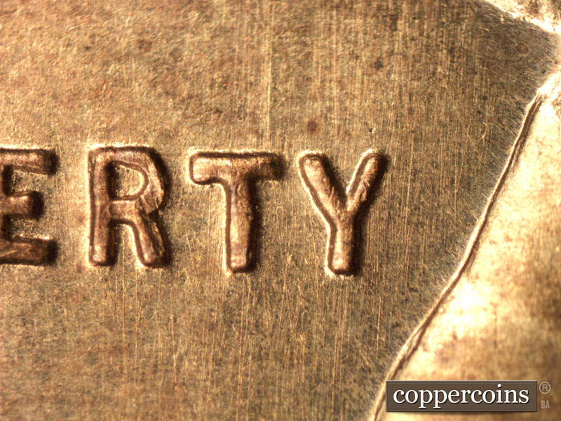 Die-stage B marker on 1942S•1DR•001 (1942 Doubled Die Reverse).