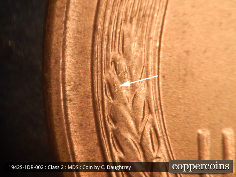 Die-stage B marker on 1942S•1DR•002 (1942 Doubled Die Reverse).