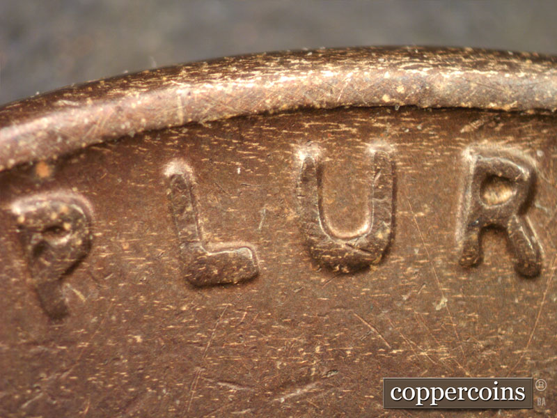 Die-stage B marker on 1942S•1DR•004 (1942 Doubled Die Reverse).